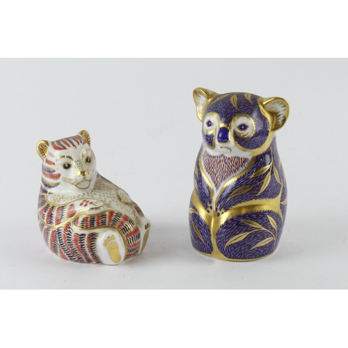 301 - Royal Crown Derby. Two Royal Crown Derby paperweights, comprising a tiger cub & a koala bear, talles... 