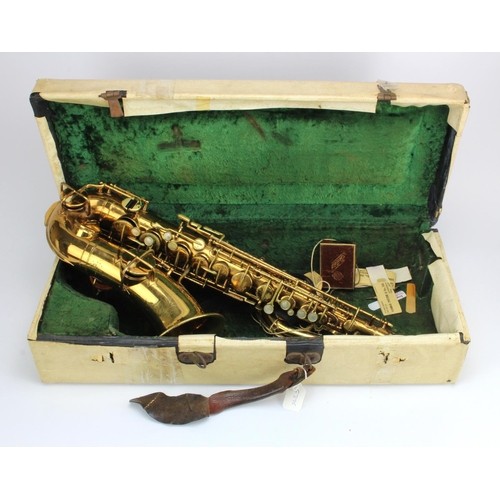 351 - Martin Elkhart low pitch saxophone (no. 42681), with neck piece, contained in a case