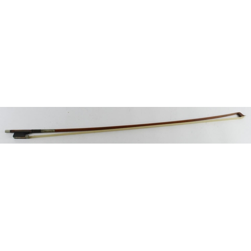 354 - Violin bow, stamped 'Tourte', with mother of pearl frog, length 74.5cm approx., weight 60g approx.