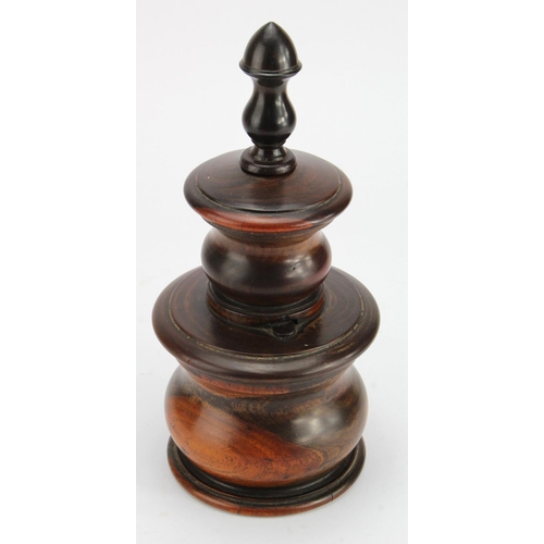 410 - Treen lignum vitae coffee grinder with bullet shaped finial, circa early 1800s, height 25cm approx.