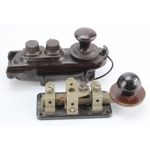 411 - Two WWII Morse Code machines, one dated 1940, length 13cm approx.