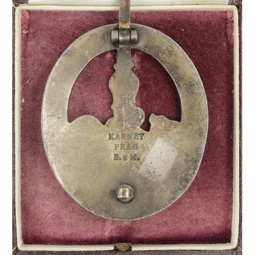 147 - German Anti Partisan / Guerilla war badge, heavy construction, maker marked Karnet, Prag, B&M in fit... 