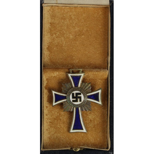 254 - German Mothers Cross in fitted case bronze.