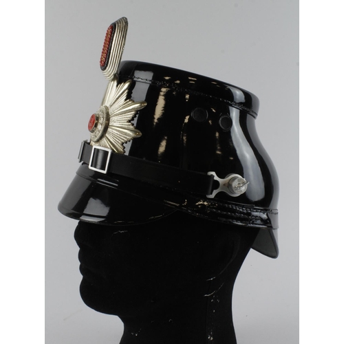 282 - German Police Shako, condition new, complete with cockade, chin strap, lining and Hansestadt Bremen ... 