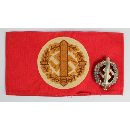 295 - German SA Brownshirts armband and Sports badge.