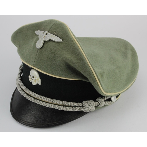 350 - German Waffen SS Officers peaked cap, all complete with badges, owners initials HP to interior.