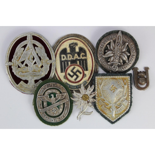 378 - German WW2 selection of tinnie style sleeve badges  (7)