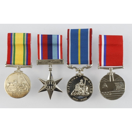 576 - Medal group of four post WW2 with cold war 1945-1991 medal named to 122840587 W/O J.A. Beresford KRR... 