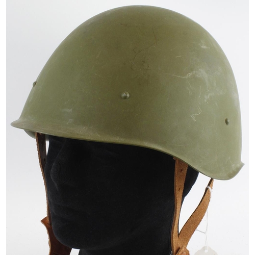 647 - Russian WW2 (?) steel helmet with chin strap and liner. Inside stamped with star in circle, 