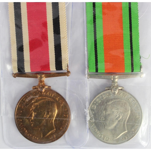 653 - Special Constabulary Medal GVI (Segt Cmdr Frederick H. Fry) and a Defence Medal.  (2)