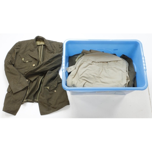 667 - US WW2 officers coat with spare lining and two WW2 US jackets and various American uniforms.