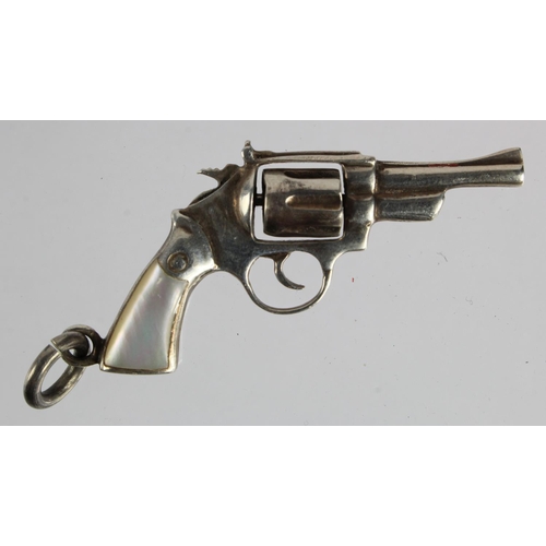 69 - Miniature silver hallmarked Pistol .825 marked, chamber even rotates, pearl grips, unusual.