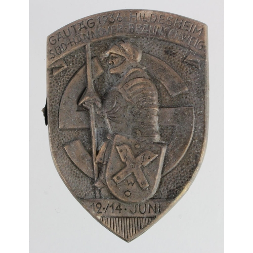 783 - WW2 German Hildesheim Rally/Gautag Tinnie Badge. Shield shaped badge dated 12th-14th June 1936 depic... 