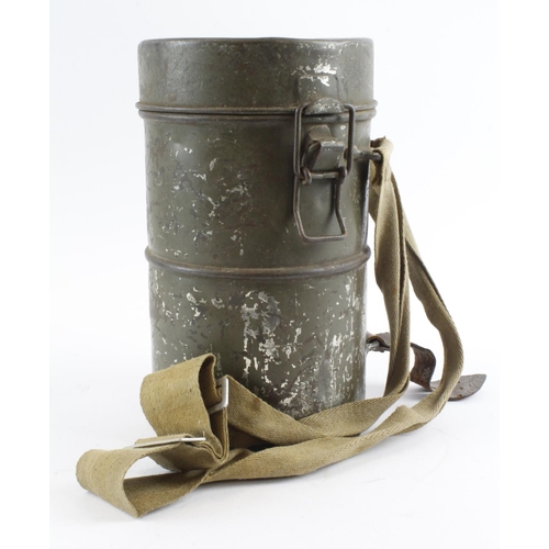 882 - WW2 scarce Hungarian gas mask in its 1938 metal storage tin complete with straps.