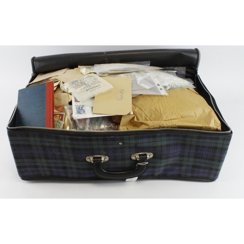 154 - Large weekend cloth suitcase with many weeks of sorting material, well stuffed with foreign stamps m... 