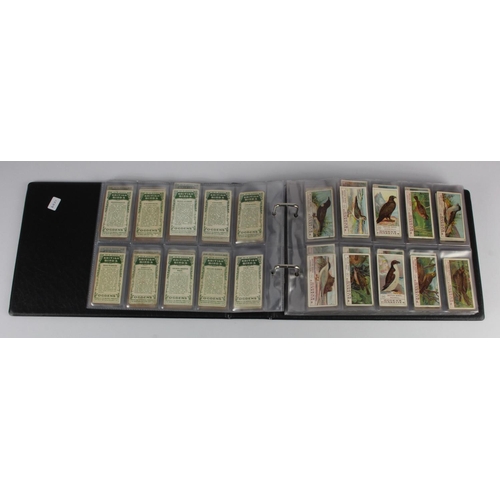 446 - Modern album containing a collection of 8 complete sets, sets include Carreras (Turf slides Famous F... 