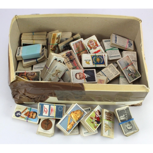 461 - White shoebox with a quantity of Cigarette Card sets and part sets in bundles.  (Qty)