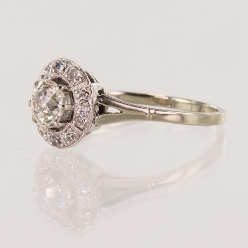 102 - White gold (tests 14ct) diamond halo cluster ring, TDW approx 0.70ct, principle old diamond approx 0... 