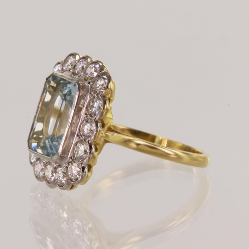 127 - Yellow gold (tests 18ct) diamond and aquamarine cocktail ring, octagonal aquamarine measures 11mm x ... 