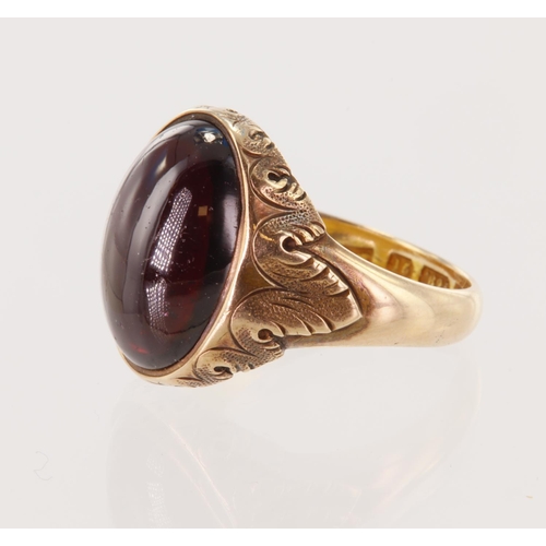 14 - 15ct yellow gold antique garnet signet ring, oval cabochon garnet measures 16mm x 11mm, bezel set wi... 