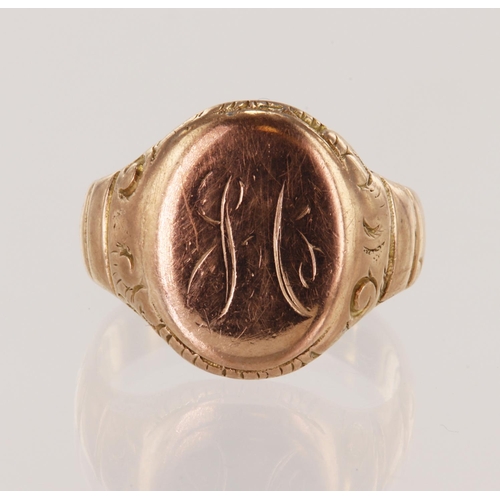 173 - 9ct yellow gold antique signet ring, oval table measures 18mm x 14mm, engraved scroll details hallma... 