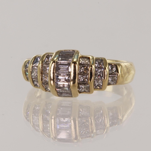 222 - Yellow gold (tests 14ct) diamond dress ring, set with princess cuts and baguette cuts, TDW approx 0.... 