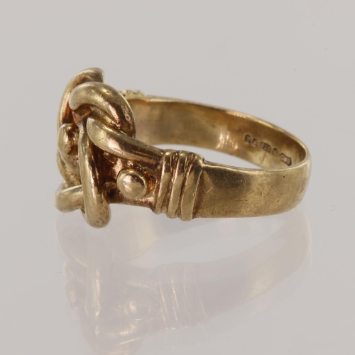 291 - 9ct yellow gold knot ring, finger size M/N, weight 5.6g.