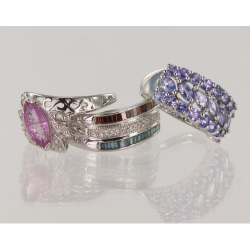 512 - Three 9ct white gold dress rings, stones include diamonds, sapphires and tanzanite, total weight 10.... 