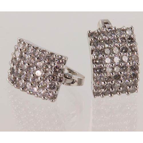 514 - White gold (tests 14ct) diamond cluster earrings, TDW approx 2.40ct, each earring measures 16mm x 11... 