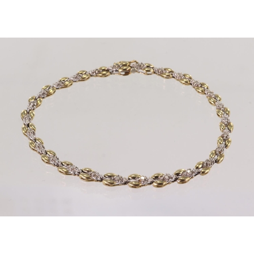 524 - Yellow and white gold (tests 10ct) diamond set bracelet, TDW approx 0.13ct, length 7