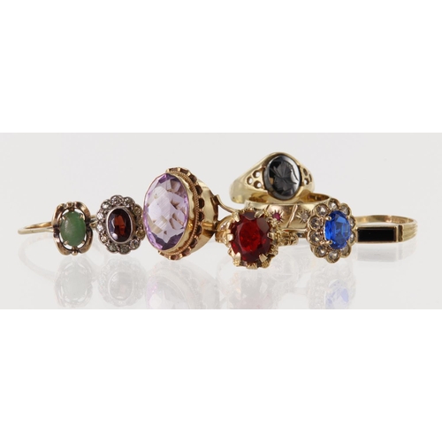 531 - Eight 9ct gold/tests 9ct rings, stones include ruby, amethyst, hematite, onyx, nephrite and paste, f... 