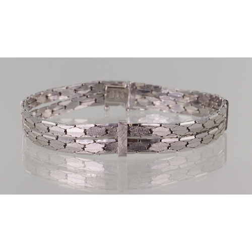 539 - White gold (tests 18ct) double milanese bracelet, total width 10mm, length 7.5