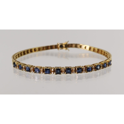 544 - Yellow gold (tests 14ct) diamond and sapphire bracelet, twelve square approx 3mm sapphires with two ... 