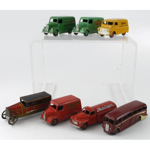 175 - Dinky. A group of seven Dinky diecast models, including four vans (Cydrax, Chivers Jellies, Kodak & ... 