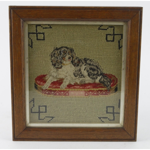 415 - Spaniel interest. Embroidered needlework depicting a Spaniel on a cushion, framed and glazed, image ... 