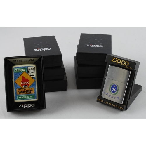 433 - Zippo. Eight cased Zippo lighters, including Peace Sign, Golf, Moon Landing, Zippo 25th Anniversary,... 