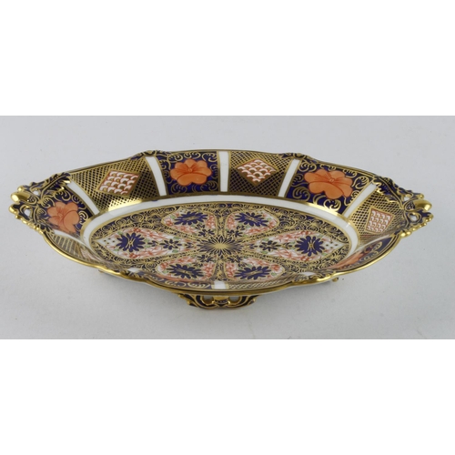 94 - Royal Crown Derby Imari pattern oval dish, raised on four feet, makers mark to base, length 23cm app... 