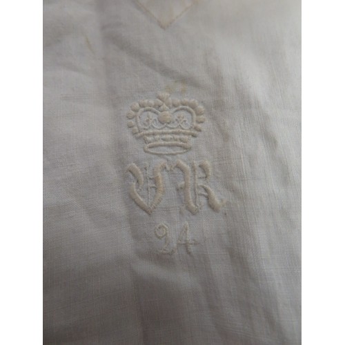 407 - Queen Victoria (1819-1901). An original night gown with Queen Victoria's royal cypher 'VR 24', embro... 