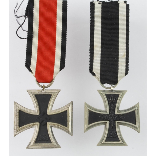 1309 - German WW2 Iron Cross 2nd Class, maker marked '77'. ? And WW1 Iron Cross 2nd Class.  (2)