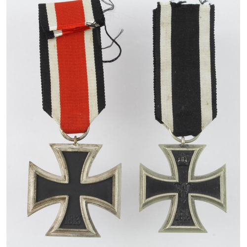 1309 - German WW2 Iron Cross 2nd Class, maker marked '77'. ? And WW1 Iron Cross 2nd Class.  (2)