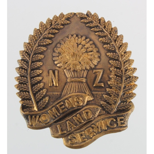 1966 - WW2 New Zealand Woman's land service badge.