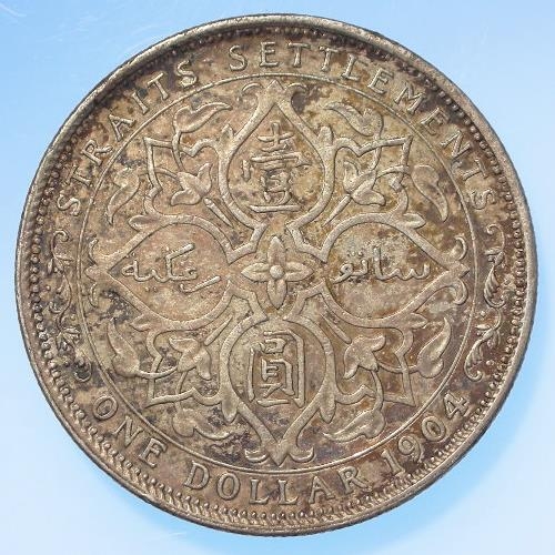 311 - Straits Settlements (Singapore & Malaysia) silver Dollar 1904 toned nEF, a few surface marks.