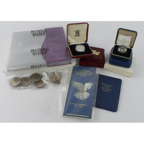 529 - GB & Commonwealth commemorative coins, Crowns and sets, including silver proofs; noted: £20 banknote... 