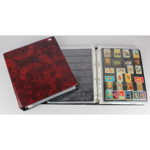 183 - Red binders with various stamps on stocksheets, cat £1400+  (2)