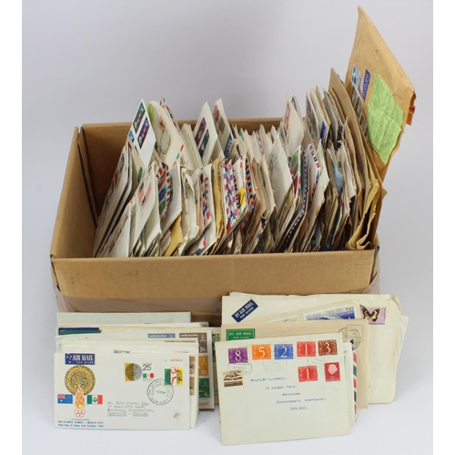 205 - Box with a diverse accumulation of World (no GB) FDC's and Commercial mail. Many countries represent... 