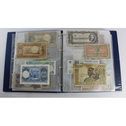 931 - World (280+), an album of mixed world notes to include Bermuda 1 Pound 1957, East Africa 1 Shilling ... 