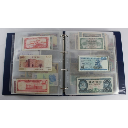 931 - World (280+), an album of mixed world notes to include Bermuda 1 Pound 1957, East Africa 1 Shilling ... 