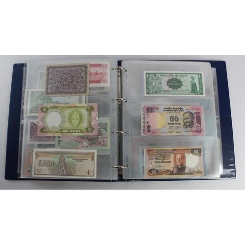 931 - World (280+), an album of mixed world notes to include Bermuda 1 Pound 1957, East Africa 1 Shilling ... 