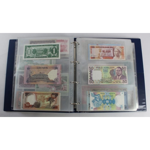 931 - World (280+), an album of mixed world notes to include Bermuda 1 Pound 1957, East Africa 1 Shilling ... 