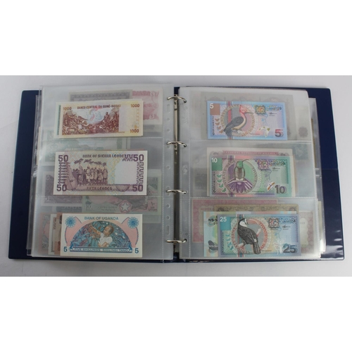 931 - World (280+), an album of mixed world notes to include Bermuda 1 Pound 1957, East Africa 1 Shilling ... 